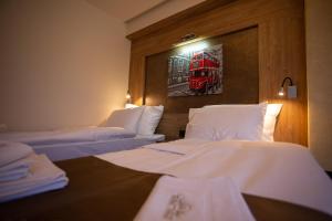 Voodi või voodid majutusasutuse Hotel Vrbak ND toas