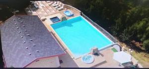 Bazén v ubytování Green Park Hotel & Residence nebo v jeho okolí