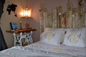 Ένα ή περισσότερα κρεβάτια σε δωμάτιο στο Pennty Breton proche plage