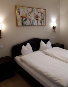 Postel nebo postele na pokoji v ubytování Transylvania Villa & Spa