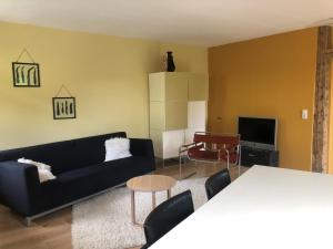 Posezení v ubytování Familienpension Obere Juchhe, Ferienwohnung und Zimmer