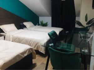 Ένα ή περισσότερα κρεβάτια σε δωμάτιο στο Apartmani Jović