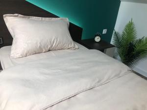 Ένα ή περισσότερα κρεβάτια σε δωμάτιο στο Apartmani Jović