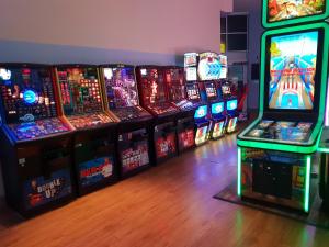 a row of arcade video games in a room at Park Home at Golden Sands Holiday Park N.Wales in Rhyl