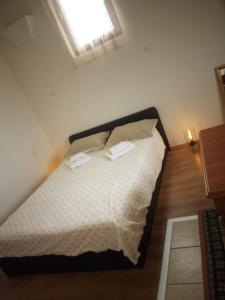 Postel nebo postele na pokoji v ubytování Apartman Milica