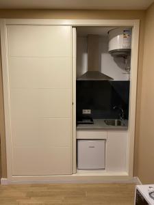 Kuchyňa alebo kuchynka v ubytovaní Finca Casaes Apartamentos