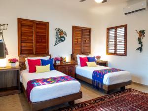 Ένα ή περισσότερα κρεβάτια σε δωμάτιο στο Casa Zarah