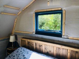 Cotswolds Camping at Holycombe客房内的一张或多张床位