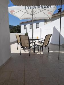 Patio lub wspólna przestrzeń na świeżym powietrzu w obiekcie TIO TESORO