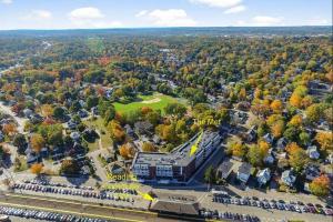 an aerial view of a campus with a building at Luxury Apartment with Gym, Steps From Commuter Rail #3013 in Reading
