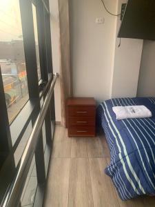 A-Hope Suite Hotel客房内的一张或多张床位