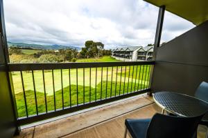 
a view through a window of a house at Novotel Barossa Valley Resort in Rowland Flat
