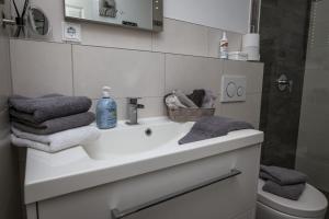 Koupelna v ubytování Ferienwohnung Heide View + 37 fotografií