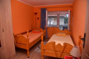 Postel nebo postele na pokoji v ubytování Apartman Stevanovic