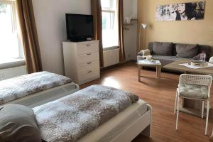 TV a/nebo společenská místnost v ubytování Ferienwohnung in Zwickau