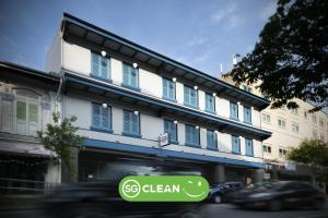 a building with a sign on the side of it at Hotel Classic by Venue - SG Clean in Singapore