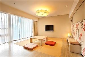 TV a/nebo společenská místnost v ubytování Chihpen Century Hotel