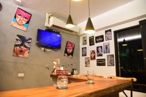 TV/trung tâm giải trí tại Living House