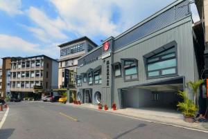 a building on the side of a city street at Royal Holiday Imv in Baihe