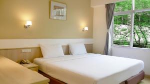 Postel nebo postele na pokoji v ubytování Trang Hotel Bangkok - SHA Plus