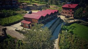 an overhead view of a building with a river in front at Horio Villa in Uzungöl