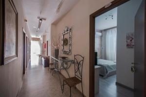 Postel nebo postele na pokoji v ubytování Hotel Sabatino