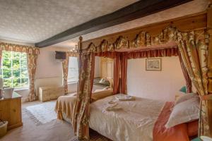 A bed or beds in a room at New House Farm Bed and Breakfast 