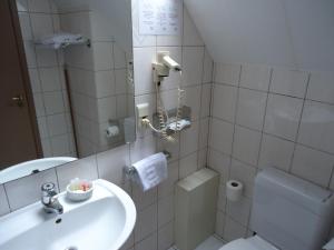 Koupelna v ubytování Résidence-Hotel Le Quinze Grand Place Brussels