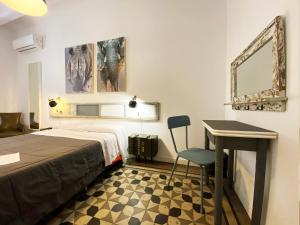 Posteľ alebo postele v izbe v ubytovaní Hostal Portugal