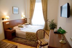 Posteľ alebo postele v izbe v ubytovaní Hotel Polonia