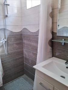 Koupelna v ubytování Vikendica pored Drine Foča