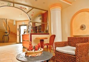 Posedenie v ubytovaní Hotel Il Faro Della Guitgia Tommasino