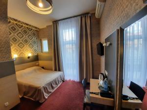 Łóżko lub łóżka w pokoju w obiekcie Hotel Kazimierz