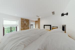 Posteľ alebo postele v izbe v ubytovaní Owntown Apart Hotel