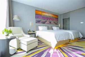 Ένα ή περισσότερα κρεβάτια σε δωμάτιο στο Lavande Hotel Shijiazhuang Zhonghua North Street Zhongchu Plaza Branch