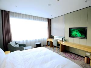 TV a/nebo společenská místnost v ubytování Lavande Hotel Yanjiao Hanwang Road Branch