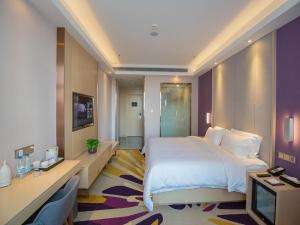 Postel nebo postele na pokoji v ubytování Lavande Hotel (Datong dongxin Plaza Branch)