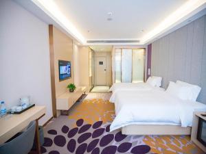 Postel nebo postele na pokoji v ubytování Lavande Hotel (Datong dongxin Plaza Branch)