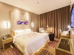 מיטה או מיטות בחדר ב-Lavande Hotel Jinzhong Yuci Walmart Branch