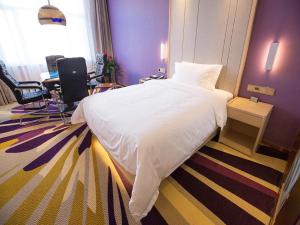 Postel nebo postele na pokoji v ubytování Lavande Hotel (Datong dongxin Plaza Branch)