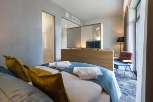 Postel nebo postele na pokoji v ubytování Hotel Zalewski