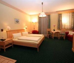 Letto o letti in una camera di Hotel Waldesruh