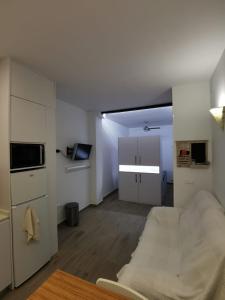 Televízia a/alebo spoločenská miestnosť v ubytovaní Apartamento Moderno y acogedor Antú, cerca de la playa