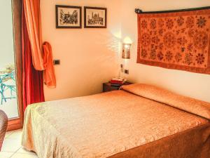 Posteľ alebo postele v izbe v ubytovaní Hotel Il Faro Della Guitgia Tommasino