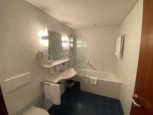 Ein Badezimmer in der Unterkunft Skycity Hotel Atrigon
