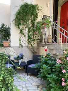Un jardín fuera de Hotel-Pension Adler Untertürkheim