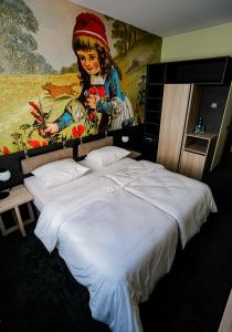 Postel nebo postele na pokoji v ubytování Hotel Viktorosa