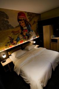 Postel nebo postele na pokoji v ubytování Hotel Viktorosa