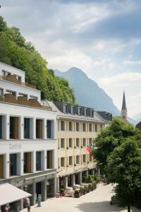 a view of a street in a town with a church at Central by Residence Hotel in Vaduz