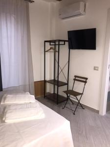 Posteľ alebo postele v izbe v ubytovaní Guest house Regina Margherita